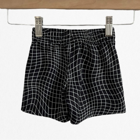 RARE Nike Black Athletic Shorts with Elastic Waistband and Green Logo - Picture 2 of 2